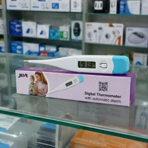 Jeve Digital Thermometer with automatic alarm displayed on product box in a realistic pharmacy display setting